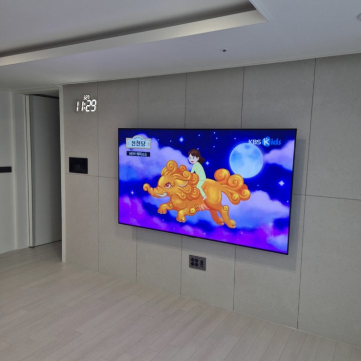 강동구 대형TV 높이 조정 현장